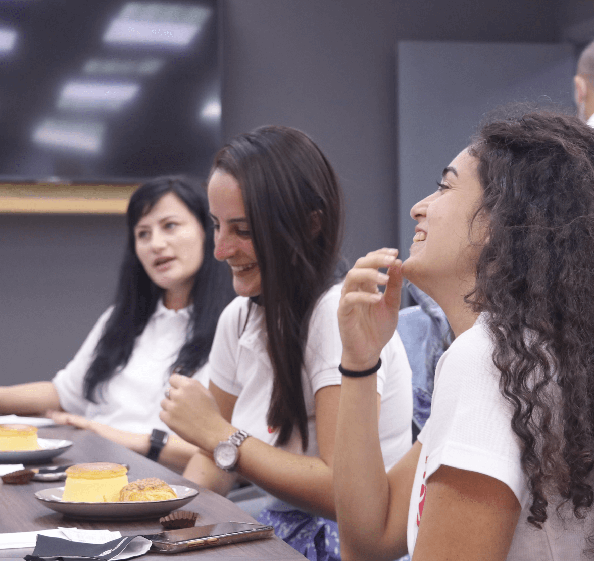 Colleagues Laughing In Breakroom